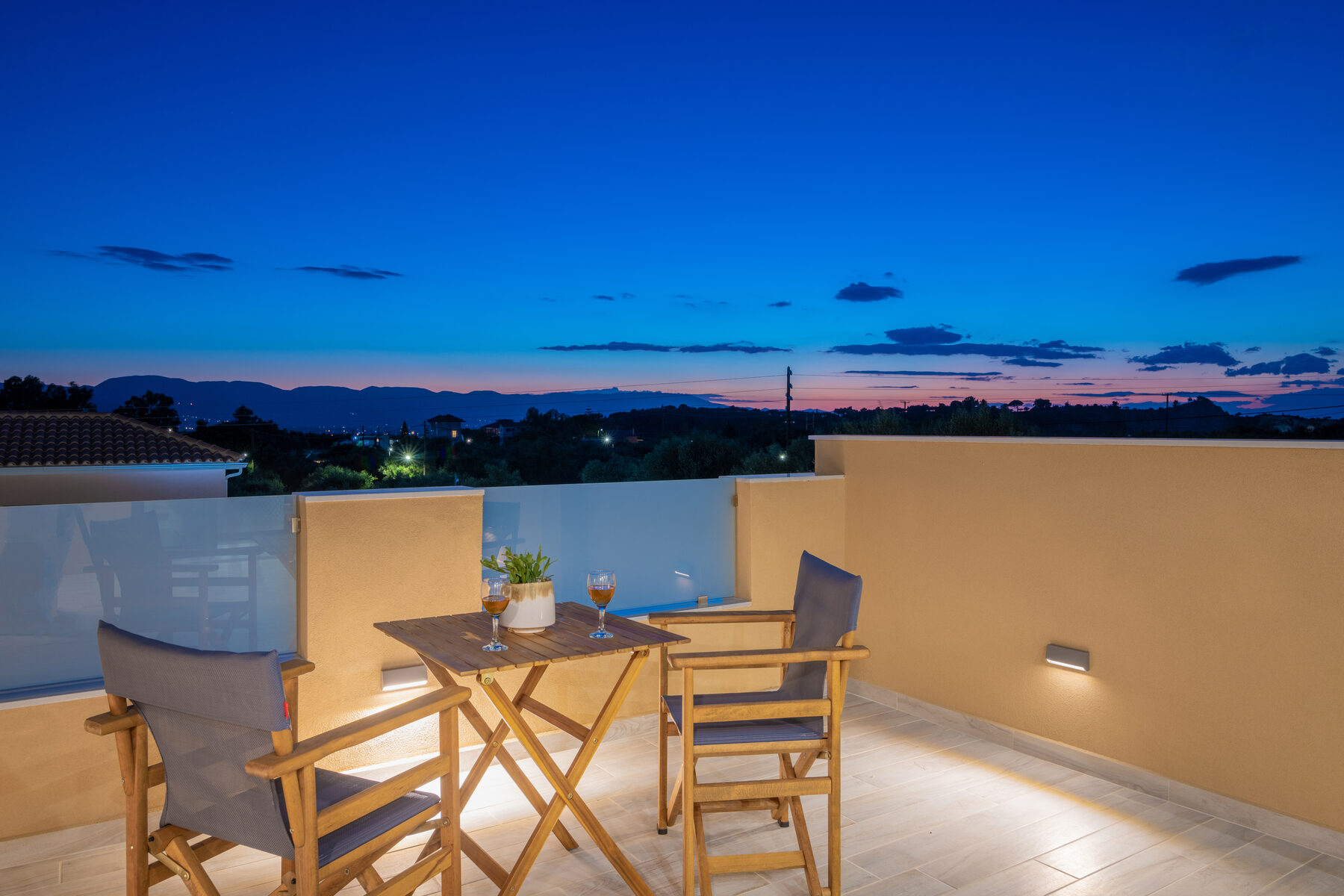 Romanza Villa II rooftop terrace at dusk