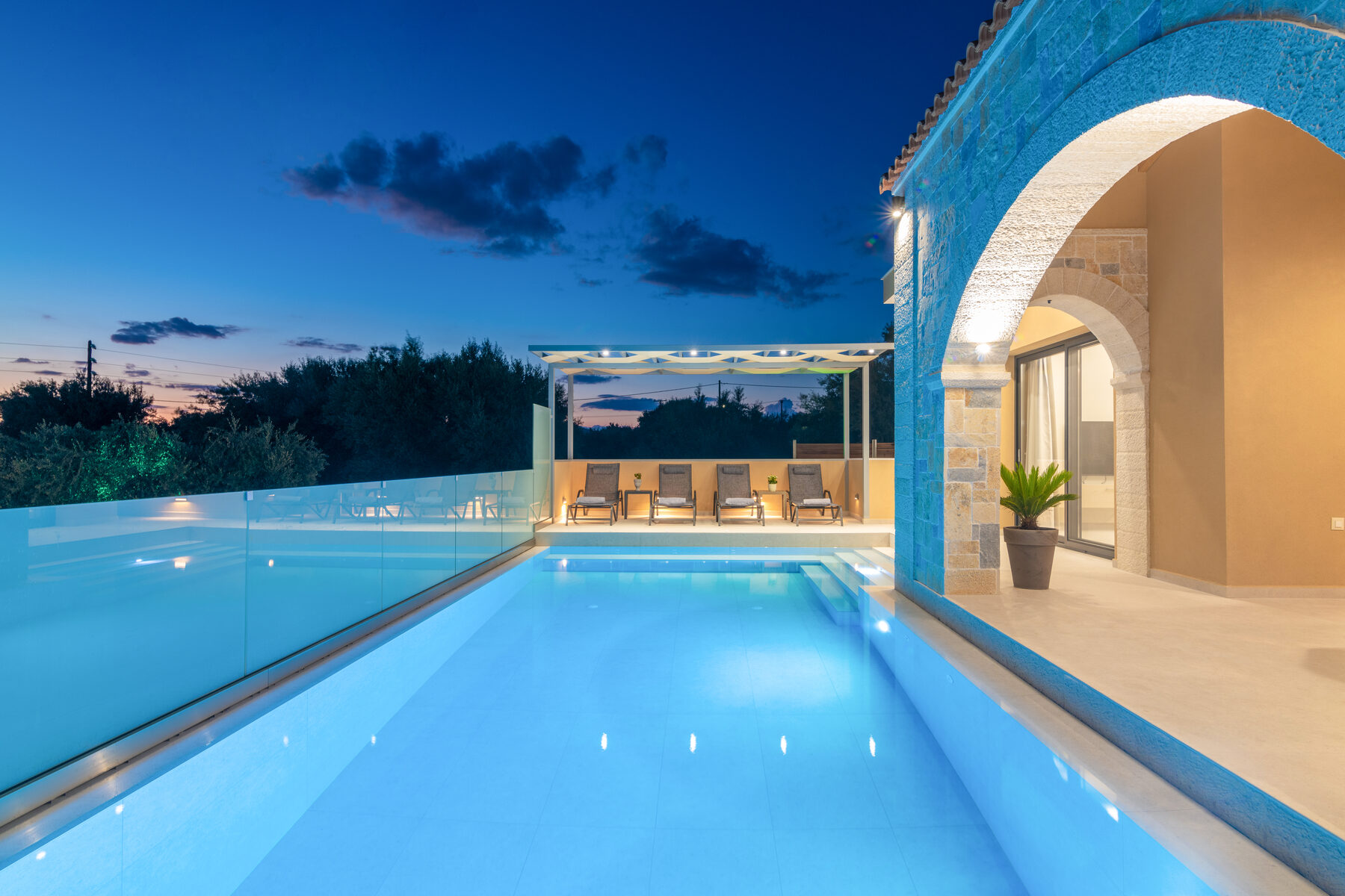 Romanza Villa II pool at dusk